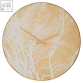 Celina gold finish branch design wall clock with beige background white tree branch patterns and gold-toned hands
