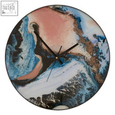 Celina pink and blue wall clock with swirling abstract design in blue white pink and black for blue wall decor