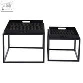 Black metal framed celina set nesting tables with textured checkered surface and integrated handles for serving or display