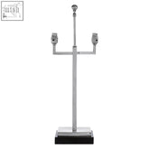 Silver-toned three-armed chancel lamp base with sleek design and black marble rectangular lamp base for modern decor