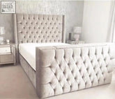 A plush light gray velvet chelsea tv bed with tufted headboard and footboard that fits tvs and offers stylish bed features