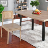 Beige mango wood dining chair with woven cane backrest and black metal legs perfect for dining rooms