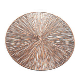 Copper-toned circular placemat with textured radiating lines in rose gold from chic home placemats set of 2