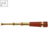 A classic churchill brass effect telescope with rich red leather grip and gold toned accents in brass effect style