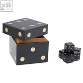 Black dice-themed storage box with gold dot accents and matching black dice set by churchill games