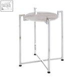 A sleek cibal white marble side table with grey veining and slender chrome legs perfect for any modern space