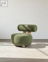 Olive green claire armchair with plush boucle fabric and light wood legs offer financing and low shipping cost available