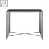 Clarice granite top console table with sleek black granite top and slender stainless steel legs in stacked design