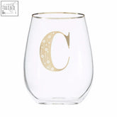 Clear glass curved tumbler featuring a gold letter c with a dotted pattern in the claro letter c curved tumbler design