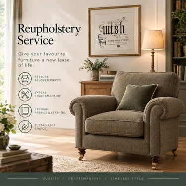 A classic armchair upholstered in a textured, tweed-like fabric with dark wooden legs and brass casters.
