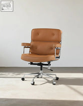Classic lo8 executive office chair in tan brown leather with chrome metal frame and five-star base