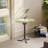 Cleo side table olive green with a matte sage green top and dark bronze metal base perfect for piano baking varnish setups