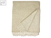 Beige clova merino lambswool throw with subtle geometric pattern and cream fringe perfect for cozy nights and blanket size guide