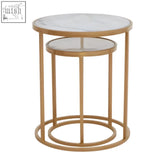 Set of two nesting tables with gold metal frames and white marble tops perfect for stylish side use