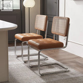 Brown leather tufted seat and cane back cornelia dining chair with chrome cantilever frame for stylish dining