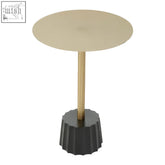 Corra gold side table with a gold-toned circular top and sleek fluted black base for stylish spaces