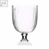 Clear glass medium glass hurricane candle holder with vertical ribbed texture and tiered pedestal base