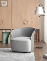 Modern gray upholstered cozayh dressing table chair with rounded minimalist design for dressing table use