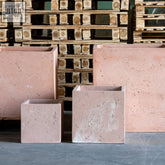 Pink terracotta square planter with textured rustic finish made of pigmented cement stone cubrosa blushstone 100cm xxl block pot