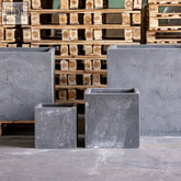 Gray extra large concrete square planter with textured rustic finish perfect as a cement stone block plant pot