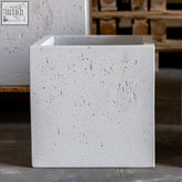 A minimalist white mist cement stone planter with a textured speckled surface and clean square edges in 30cm size