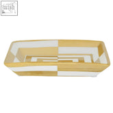 Rectangular curva ceramic gold and white dish with geometric pattern of alternating gold and white stripes