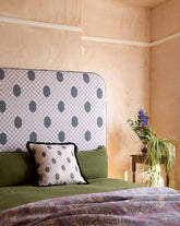 Curved piped headboard with deco checkers in light gray white and black polka dots soft fabric upholstery