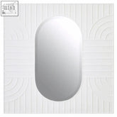 White oval-shaped danta off white wall mirror with a smooth reflective surface for stylish off-white wall decor