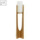 Dante large gold finish candle holder with a gold-toned modern design holding a white cylindrical candle inside