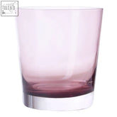 A translucent pink darcy smoked glass tumbler with a sturdy clear base perfect as a mixer glass