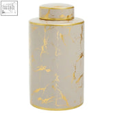 A sleek daria small ceramic jar with glossy white porcelain and gold leaf patterns perfect for tea storage