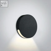 Black circular aluminium wall recessed light from dark light step series with matte finish and curved light emission