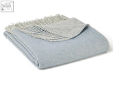 A dartmoor reversible pure new wool throw in blue mist with cream fringe and soft textured weave, perfect blanket size guide