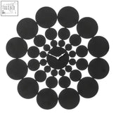 Black datsun black discs wall clock with circular rings and sleek metallic hands in minimalist black discs design