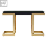 Deana gold black console table with sleek black glass top and gold geometric angular legs perfect for entryway use