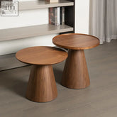 Two minimalist decuro side tables with sturdy construction smooth warm brown wooden finish and tapered conical bases