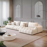 Cream delilah violet two seater sectional sofa with plush tufted cushions and modern minimalist design four seater sofa