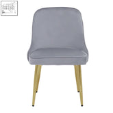Gray velvet dining chair with slender gold-tone legs perfect as a stylish grey dining chair option