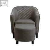 Derby grey faux leather tub chair with matching ottoman in quilted suede-like grey faux leather with dark nailhead trim
