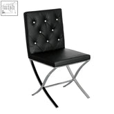 Black tufted leather effect chair with chrome x-shaped legs perfect for stylish modern seating