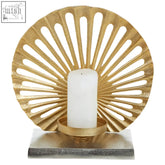 Gold-toned fan-shaped candle holder with white candle in center part of dion large two-toned silver and gold finish candle holder