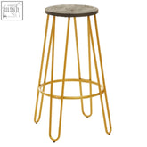 District gold finish metal frame bar stool with gold hairpin legs and a round dark wood seat for kitchen or bar area