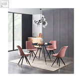 Modern pink upholstered dining chairs with black metal legs and gold tips paired with dorchester lux dining table