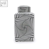 A large black and white ceramic jar with a sleek geometric spiral pattern perfect as a white ceramic jar decor piece