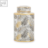 Doria small leaf design ceramic jar in white with gold trim and black and gold leaf design ceramic jar