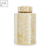 Gold ceramic jar with zebra-striped pattern and matching lid doria small white ceramic jar for tea storage