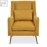 A mustard yellow velvet chair with high back cushion and gold finish slender metal legs perfect for living rooms