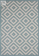 A teal and cream ecology outdoor rug aqua with geometric pattern and woven texture perfect for outdoor use
