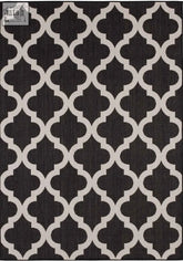 Black and cream geometric ecology outdoor rug with repeating quatrefoil design perfect as outdoor rug black