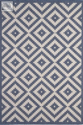 Blue and cream geometric patterned ecology outdoor rug in outdoor rug blue perfect for patio or garden use